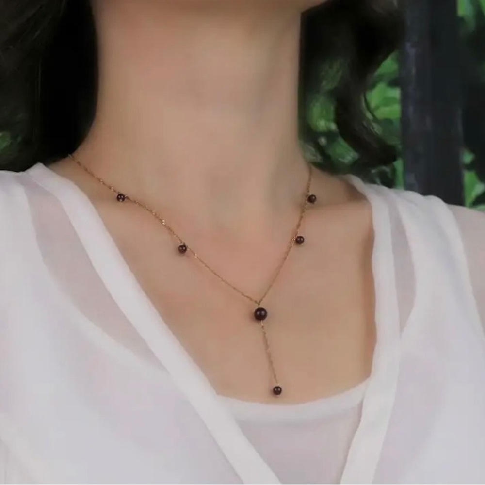 Pristine 10k gold garnet balls chandelier necklace